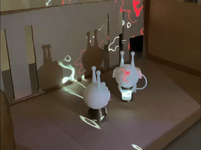 Our final prototype for Project 2 is a miniature model of the Marquee which uses a small projector that displays MIDI input-affected visuals. Pressed keys of a keyboard change the colour of the design.